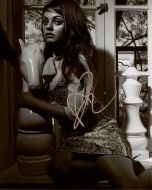 Mila Kunis - (Earn 7 reward points on this item worth £1.32)